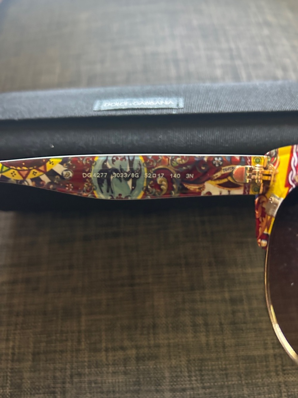 Dolce & Gabbana Black and Gold Cat-Eye Women's Sunglasses with Gradient Lenses - Picture 3 of 3